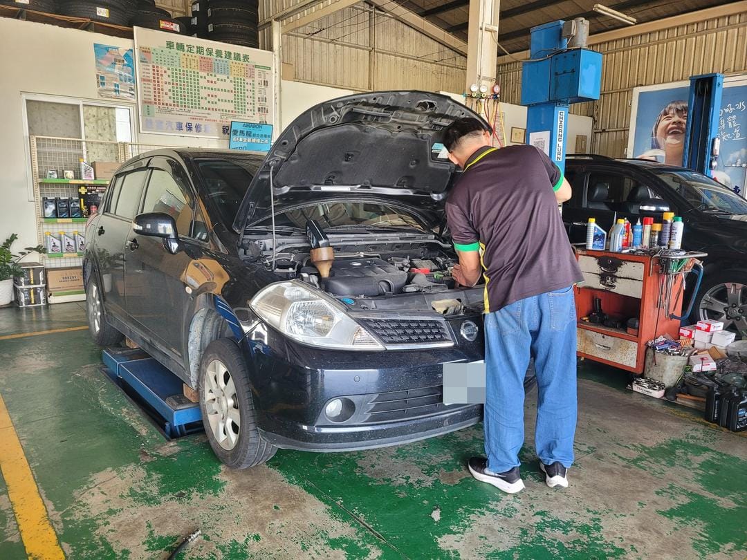 巧遇黑色Tiida做定保