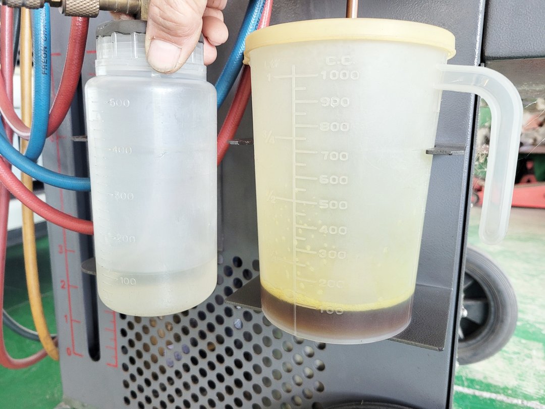 Tiida更換節溫器座墊片&水泵浦&查修冷氣