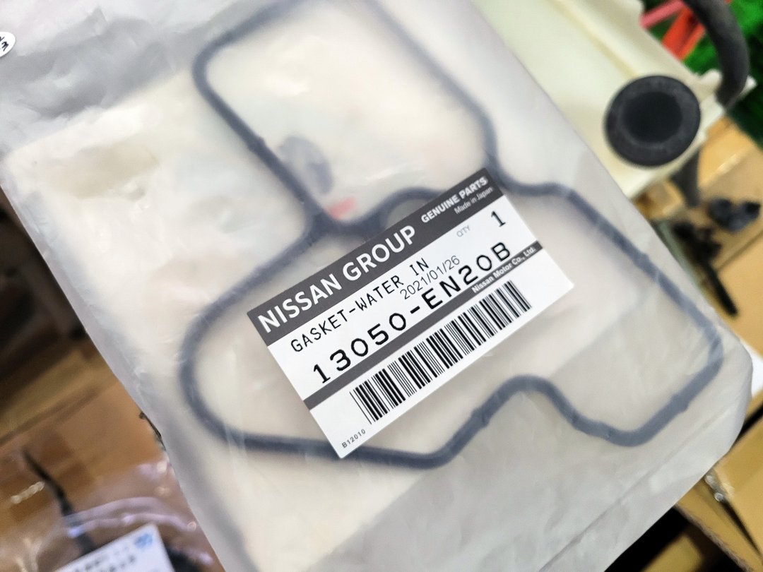 10′ 黑 Tiida 1.8L 4D 更換節溫器座墊片