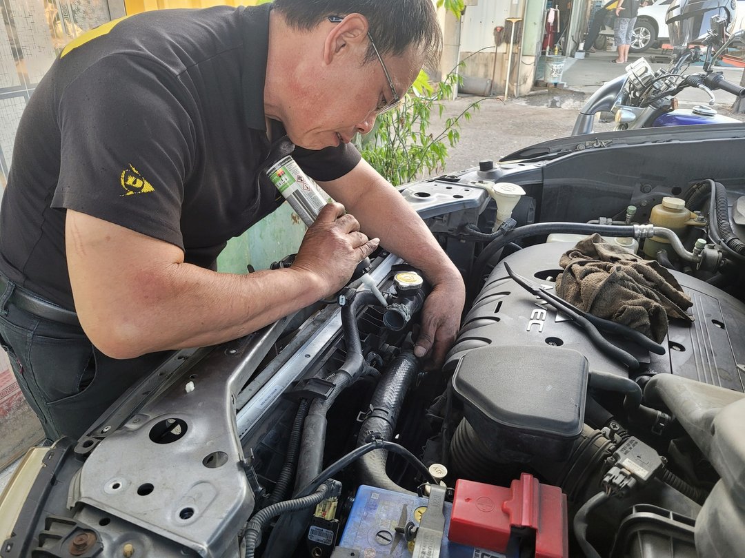 09′ 灰 Outlander 更換水箱總成